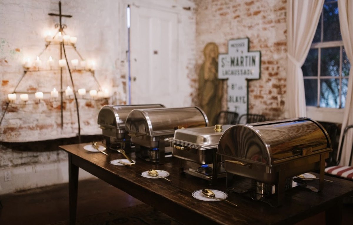 Rustic buffet table with chafing dishes
