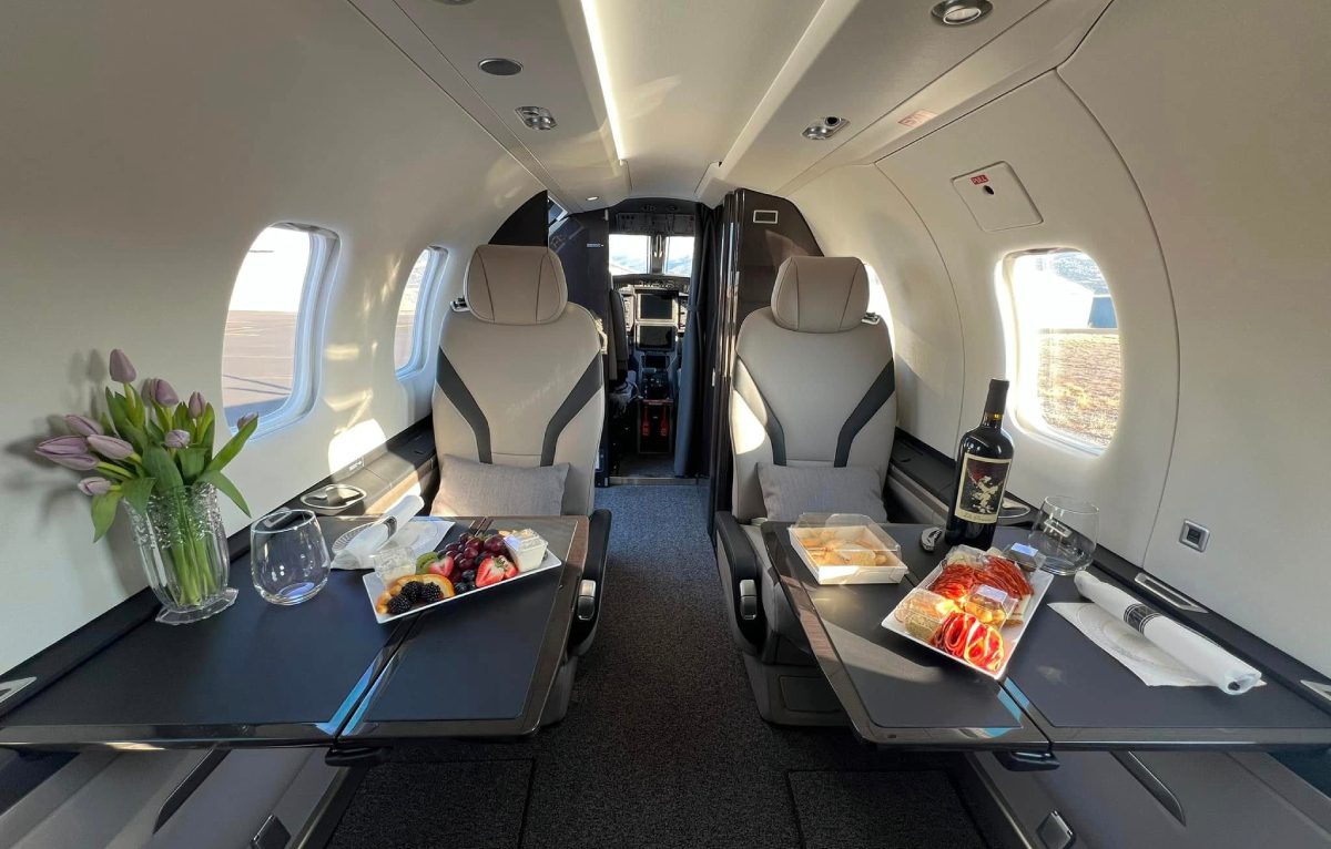 Private jet cabin with meal service