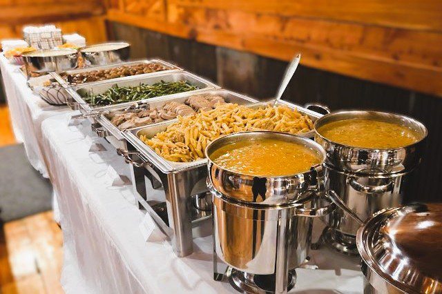 Catered buffet table with chafing dishes