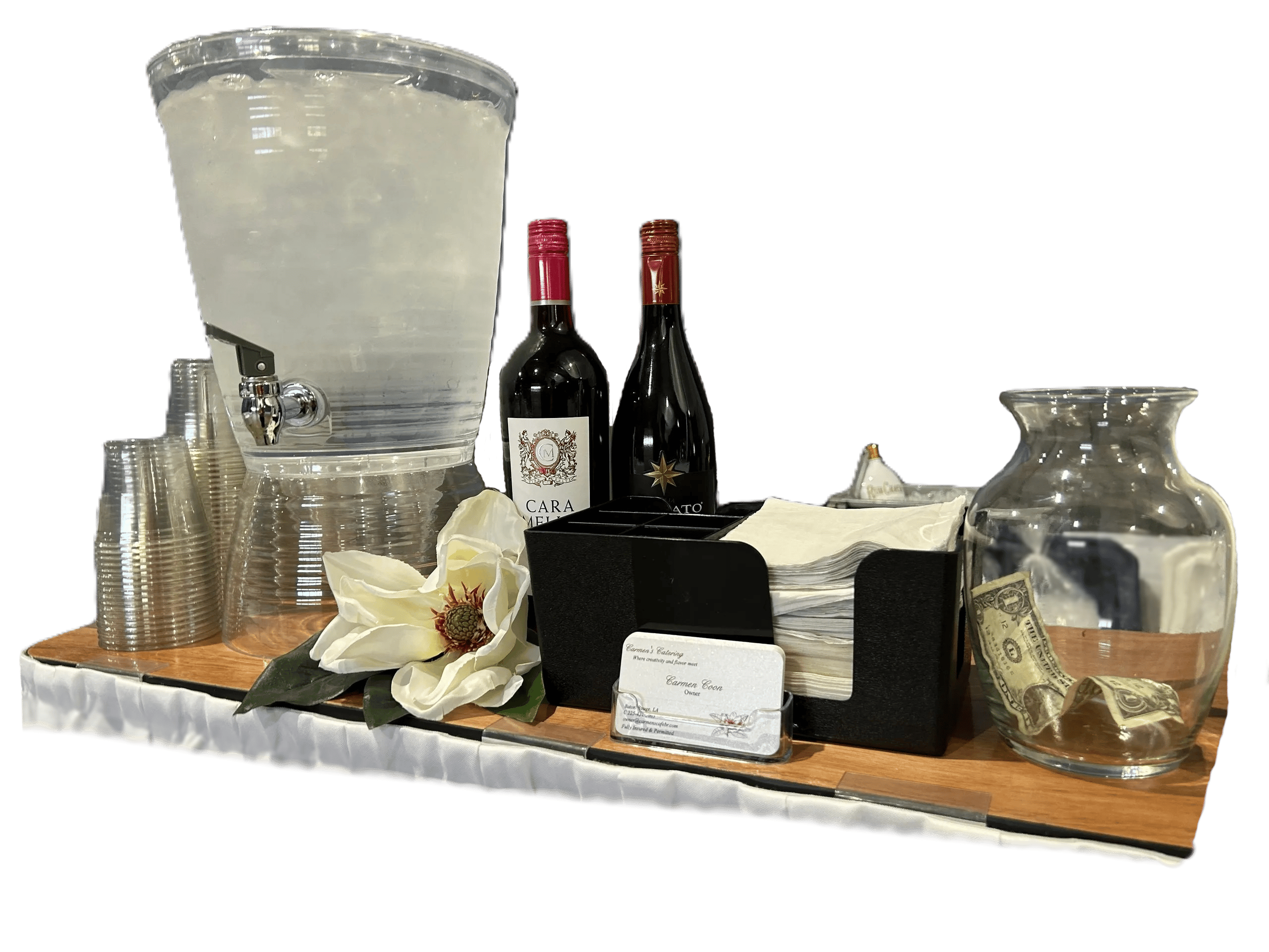 Beverage station with wine bottles and tip jar