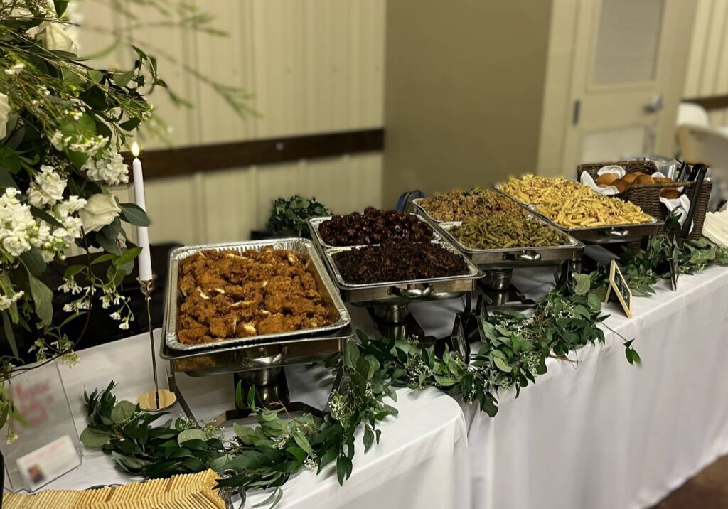 Catered buffet table with chafing dishes